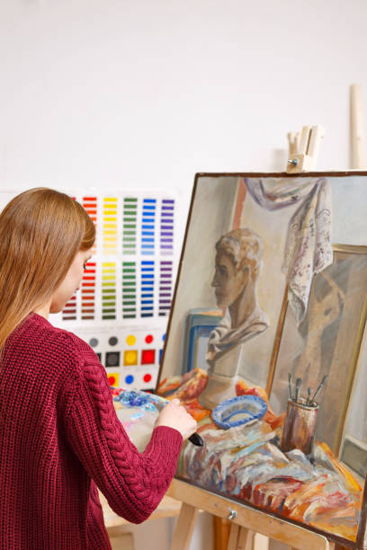 istock Girl in art school 673795432