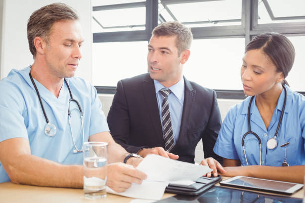 istock Medical team interacting in conference room 673799202