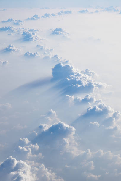 istock Clouds in blue sky, aerial view from airplane window. 673803990