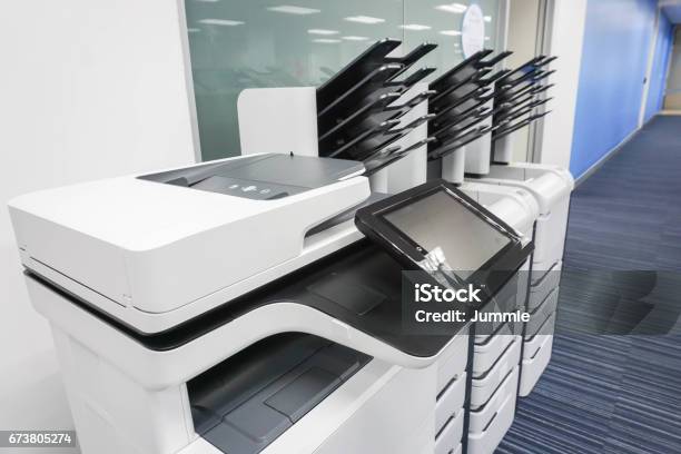 Close Up Office Printers Set Up Ready For Printing Business Documents Stock Photo - Download Image Now