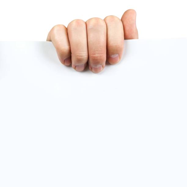 istock Man hand holding blank advertising card on white background. Close up. 673822358