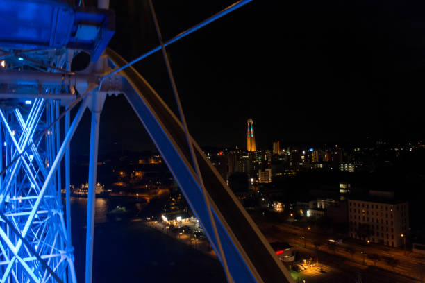 istock Night city and Ferris wheel 673825314