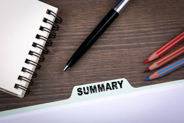 istock Summary Concept.  Folder Register on a dark wooden desk 673829486