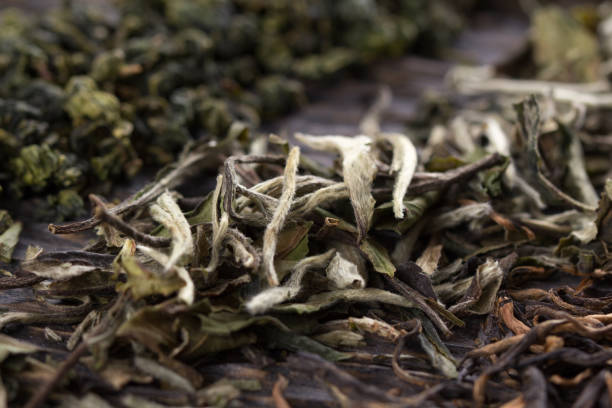 istock Dry leaves of different types of tea 673830288