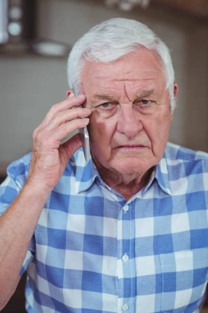 istock Senior man talking on mobile phone 673837254