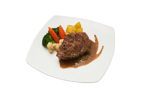 istock Isolated of pork chop steak. 673841096