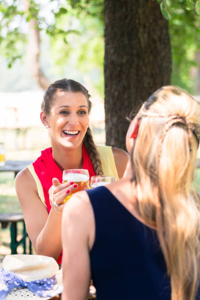 istock Women in beergarden having refreshment 673844070