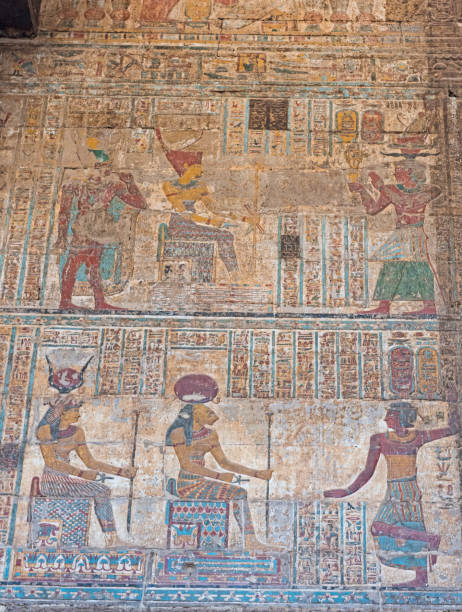 istock Hieroglyphic carvings on an ancient egyptian temple wall 673844488