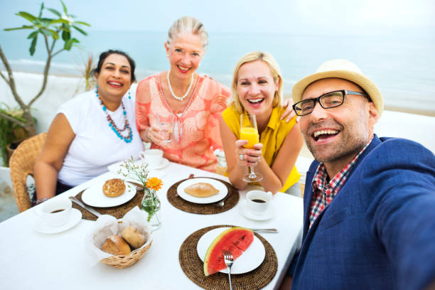 istock Mature Friends Fine Dining Outdoors Concept 673844836