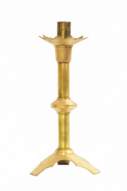 istock Old brass candle holder on white background 673847546