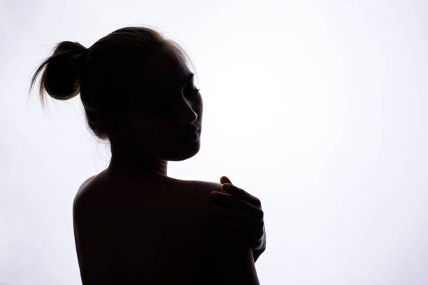 istock silhouette of beautiful young woman 673847700