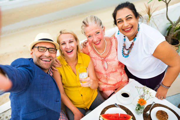 istock Mature Friends Fine Dining Outdoors Concept 673850770