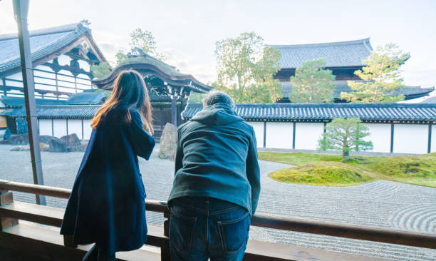 istock Couple at Tofuku-ji Temple 673851188