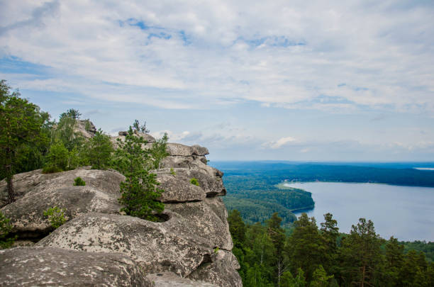 istock Mountain lake landscape and pines 673851518