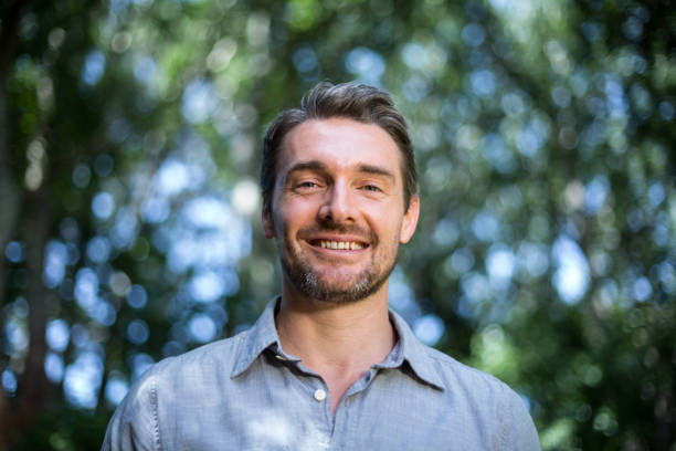 istock Portrait of happy young man 673851730