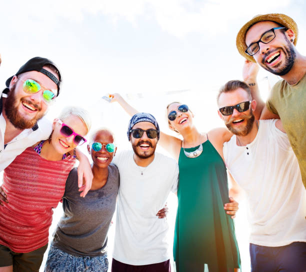 istock Group Of People Hugging Concept 673854358