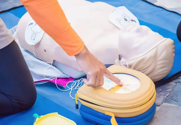 Photo of cpr training chest compression dummy basic life support