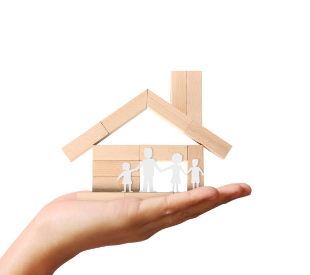 istock Mortgage concept by house from in hand 673858092