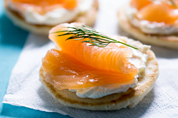 istock Blinis with white cream cheese and salmon 673858496