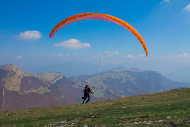 istock Skydiver in flight against the backdrop of the mountain 673858534