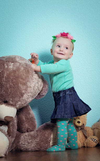 istock Little girl is playing with toys. 673861506