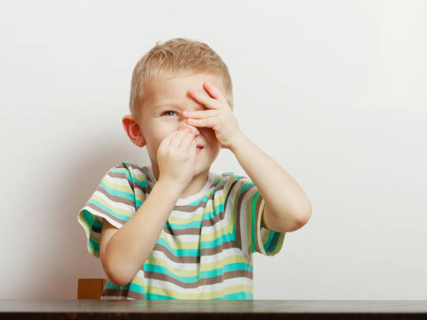 istock Happy kid boy looking straight to camera 673861542