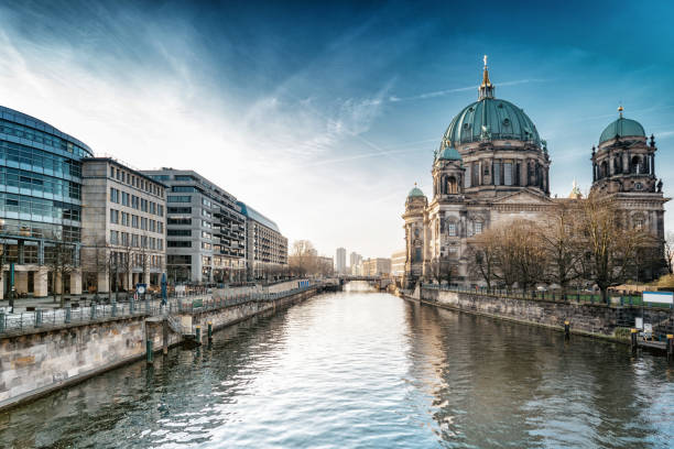 istock Berlin Cathedral with reflection in river spree at morning hour 673866298
