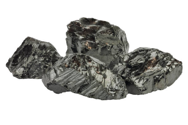 istock Pieces of raw coal isolated on white background 673869620