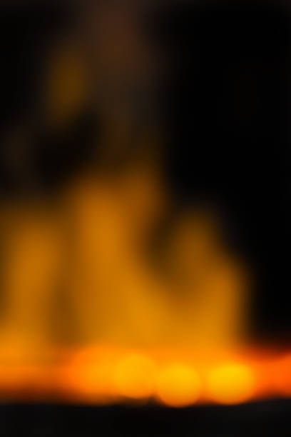 istock Blurred background of coal fire in smithy 673869798