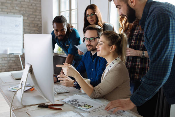 istock Beautiful woman working in architect and designer  modern office 673870490