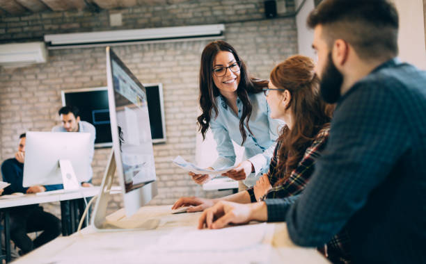 istock Corporate teamworking colleagues working in modern office 673873746