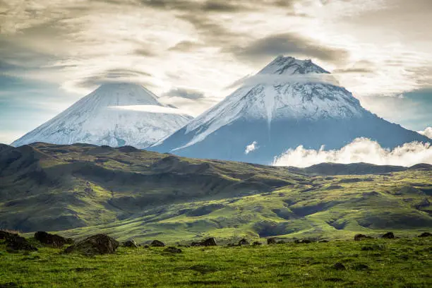 The highest volcanoes of Kamchatka: Klyuchevskoy (4835) and Stone 4585).