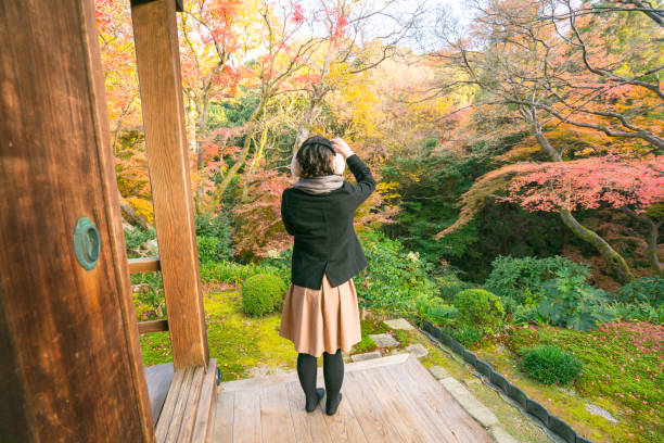 istock Woman at Tofuku-ji Temple 673884512
