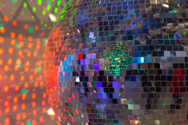 istock Party background with glowing lights and disco ball 673884806