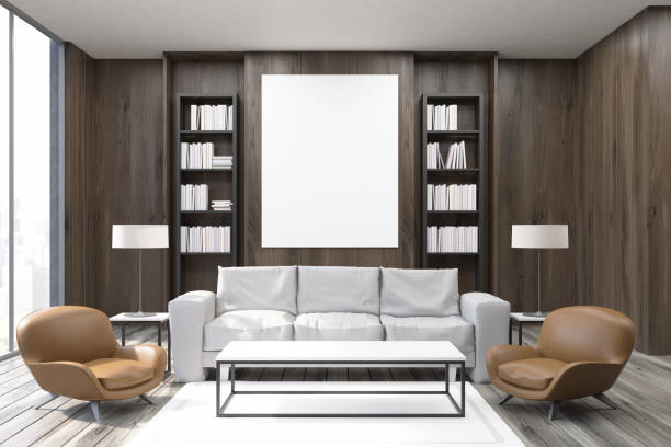istock CEO office with dark wooden walls, armchairs 673892142
