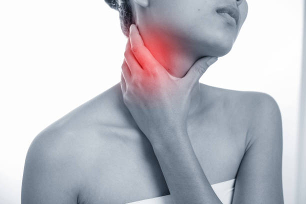 istock sore throat, shown red, keep handed, isolated on white background 673897662