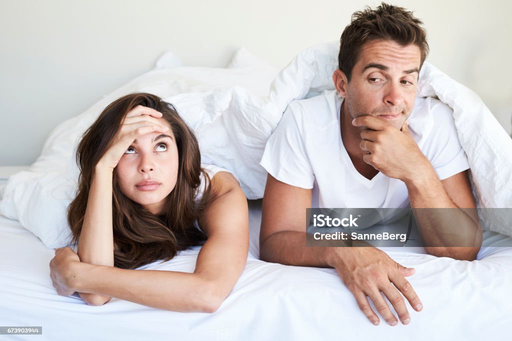 Problems in the bedroom Couple having problems in bedroom Couple - Relationship Stock Photo