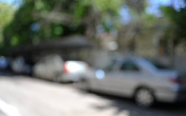 istock Abstract Blurred Cars in Parking Lot 673926094