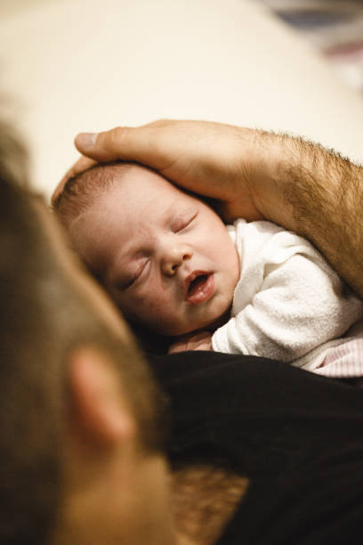 istock Cute newborn baby girl sleeping 673928720