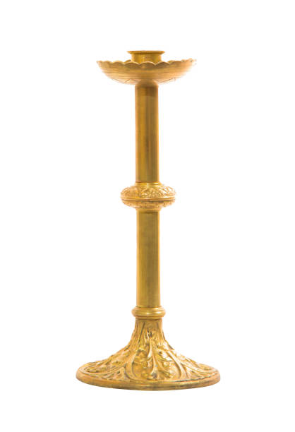 istock Old brass candle holder on white background 673936956