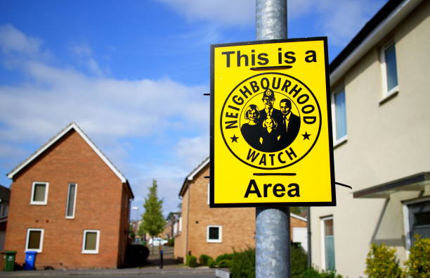 Neighborhood Watch Sign Bracknell, England - April 12, 2017: Sign warning This is a Neighbourhood Watch Area on a housing state in Bracknell, England. The association aims to bring communities together and reduce crime neighborhood crime watch stock pictures, royalty-free photos & images