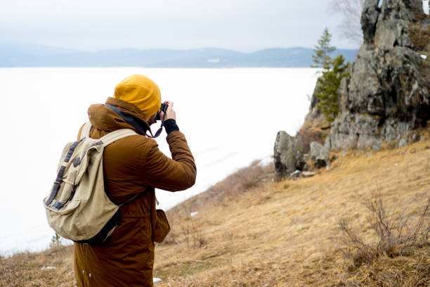 istock Photographers on a hill 673947930