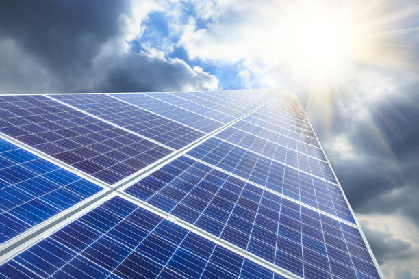 istock Solar energy panels scene in the sunset 673957730