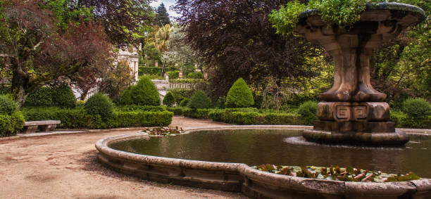 istock Empty City Park With Fountain Trees and Bench 673963976