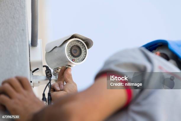 Security Camera Setting Stock Photo - Download Image Now - Security Camera, Installing, Security System