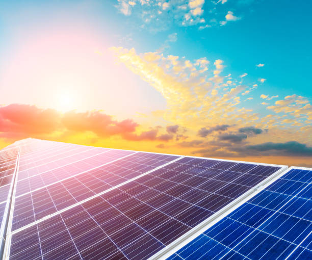 istock Solar energy panels scene in the sunset 673976720