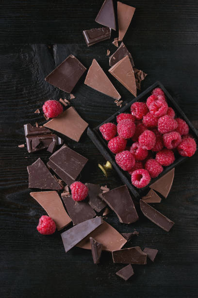 istock Variety of chopping chocolate with raspberries 673989530