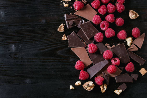 istock Variety of chopping chocolate with raspberries 673989548