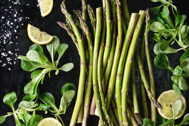 istock Bundle of young green asparagus 673990084