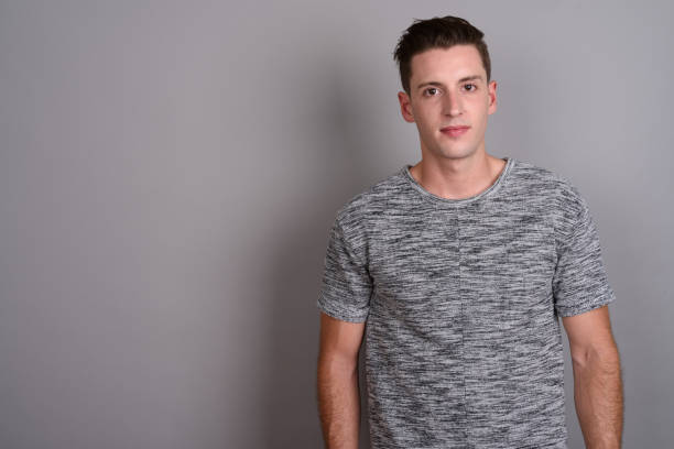 istock Studio shot of young handsome man against gray background 674005342